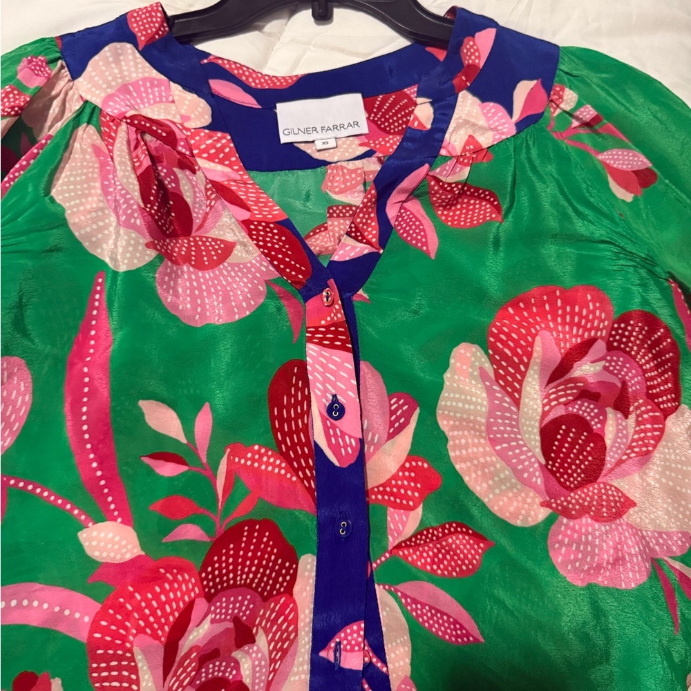 Tried on blouse, new condition